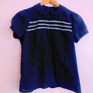 Sweet little Peter Pan collar polka dot blouse.